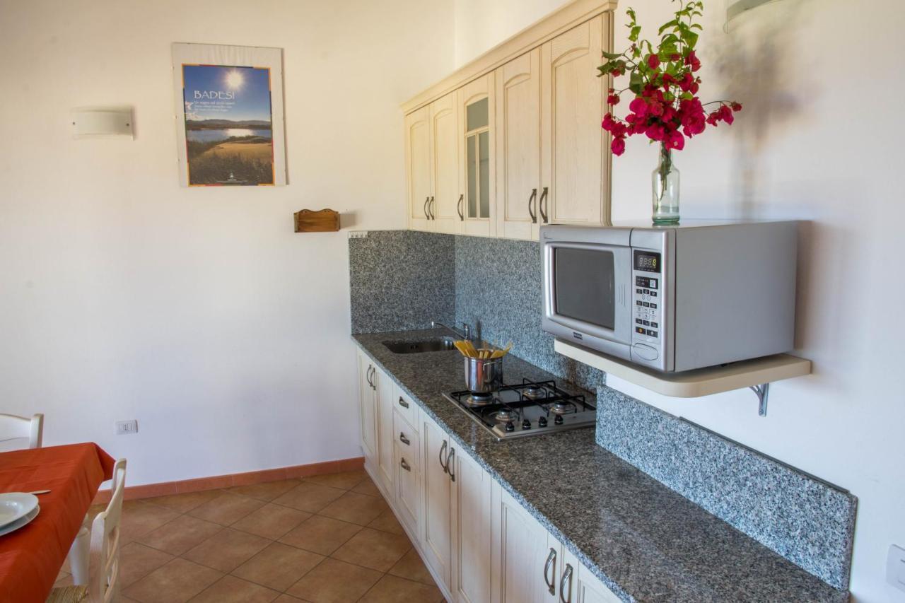 Gf Apartments Li Seddi Badesi Exterior photo